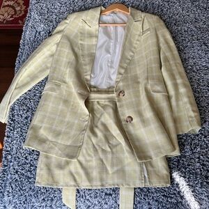 Pastel green blazer and skirt set